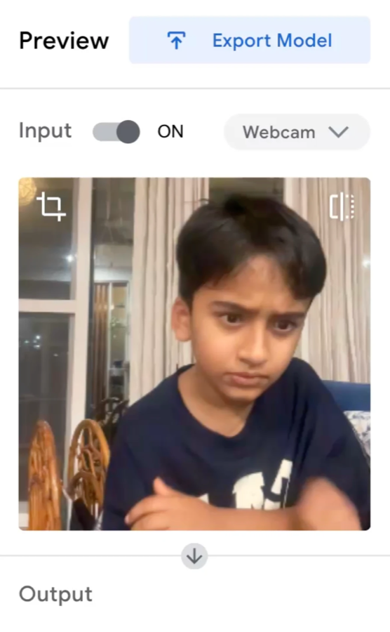 Webcam preview of a child making a frowning face while recording the second class